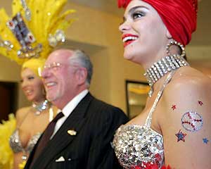 Mayor Oscar Goodman and showgirls